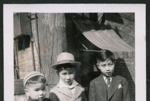 Photo of three children in suits (ddr-densho-483-350)