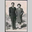 Japanese American man and woman stand together (ddr-densho-362-51)