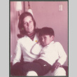 Woman holding boy in her lap (ddr-densho-523-472)