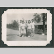Five people pose outside (ddr-densho-471-78)