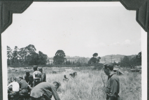 Men working in a field (ddr-ajah-2-181)