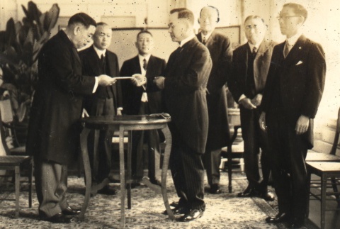 Kanekazu Okada at a formal meeting (ddr-njpa-4-1973)
