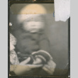 Baby in striped sweater and white beret (blurry) (ddr-densho-483-611)