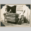 Three men moving cans of salmon (ddr-densho-383-247)