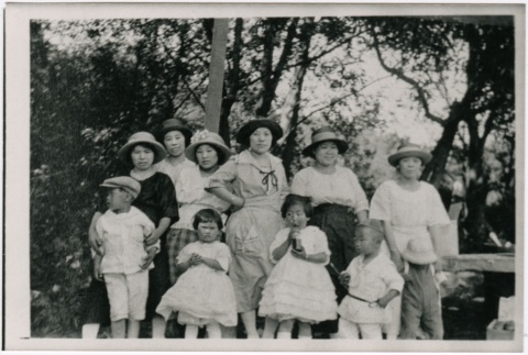 A group of women and children in a park (ddr-densho-353-230)