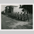 Members of the 100th Infantry Battalion marching in Vada, Italy (ddr-densho-1007-145)