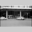 Two taxis at Tokyo Station (ddr-densho-1007-1186)