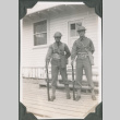 Two men standing at attention with rifles (ddr-ajah-2-139)