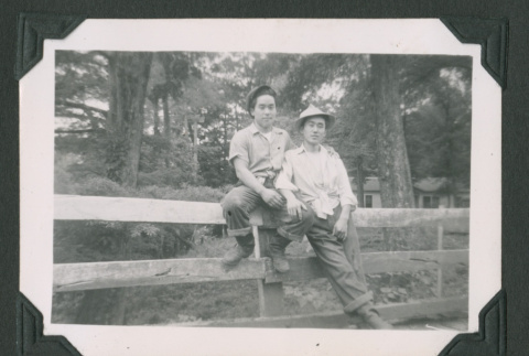 Two men on fence (ddr-densho-471-56)