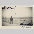 Japanese American soldier in front of barbed wire fence (ddr-densho-201-153)