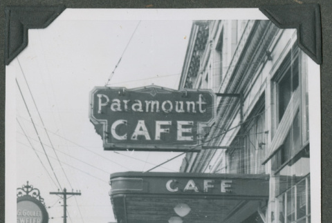 Three men in front of the Paramount Cafe (ddr-densho-201-715)