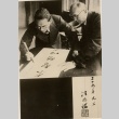 Wang Jingwei doing calligraphy (ddr-njpa-1-1038)
