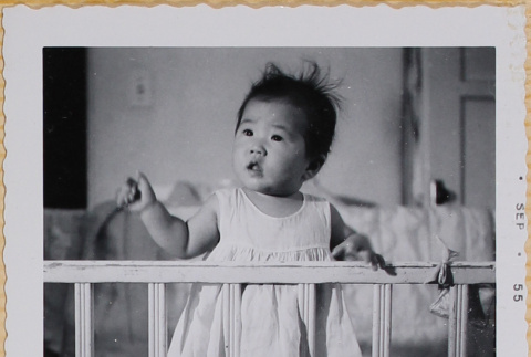 Leslie Shiomi in a crib (ddr-densho-522-369)