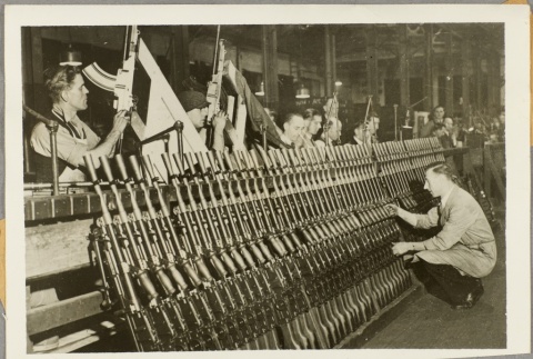 Men with guns in an armory (ddr-njpa-13-293)
