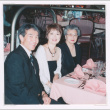 Mitzi Isoshima, Frank Nishimura, and Naomi Nishimura at a cruise dining table. (ddr-densho-477-758)