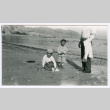 Susumu and Tory Miyoshi at beach (ddr-densho-480-157)
