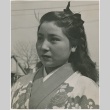 Japanese woman dressed for a festival (ddr-densho-299-179)