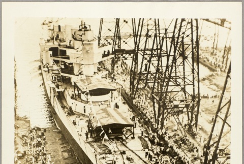 The USS Minneapolis pulling into dry dock (ddr-njpa-13-96)