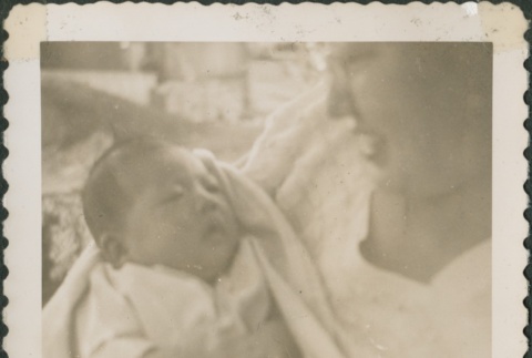 Woman holding a baby (ddr-densho-321-1079)