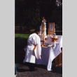 Priest and altar at Stroll Garden dedication (ddr-densho-354-1835)