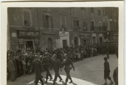 Soldiers marching down the street (ddr-densho-201-104)