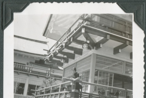 A woman standing on the deck of the Japan Pavilion at the Golden Gate International Exposition (ddr-densho-300-209)