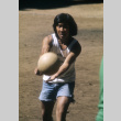 Harry Hamaouchi serving a volleyball (ddr-densho-336-851)