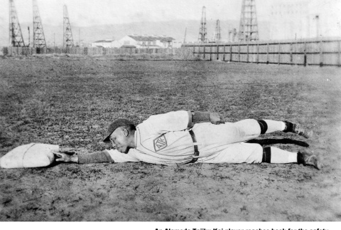 Man in baseball uniform in posed photo titled Safe!! (ddr-ajah-5-64)