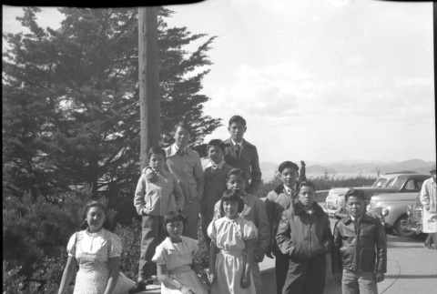 Group of children sitting at viewpoint (ddr-densho-426-958)