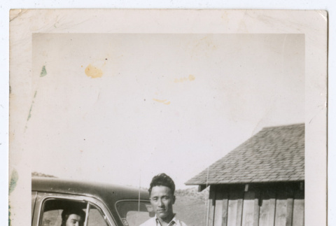Two men and a Chevrolet (ddr-densho-463-208)