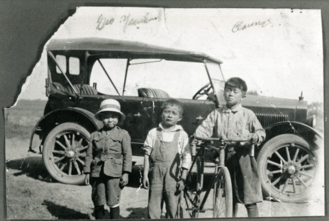 [Three brothers and a car] (ddr-csujad-29-164)