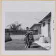 William, Susan and Leslie Shiomi standing in yard (ddr-densho-522-489)
