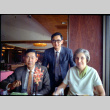 Two men and a woman in restaurant (ddr-densho-426-763)