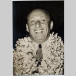 A man wearing leis (ddr-njpa-1-1160)