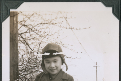 Photo of Kenji Ima holding a snowball (ddr-densho-483-1167)