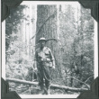 Man in uniform standing by tree (ddr-ajah-2-229)