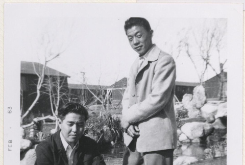 Two men in Manzanar's garden (ddr-manz-10-116)