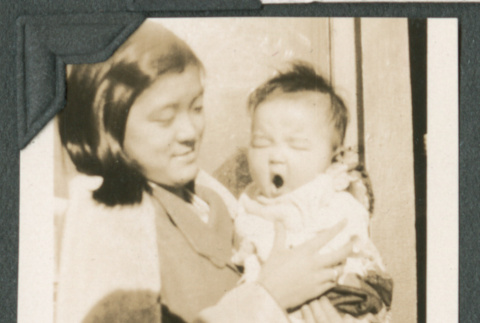Irene Kimora holding baby (ddr-densho-442-181)