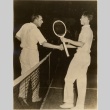 Ellsworth Vines shaking hands with an opponent on the tennis court (ddr-njpa-1-2313)