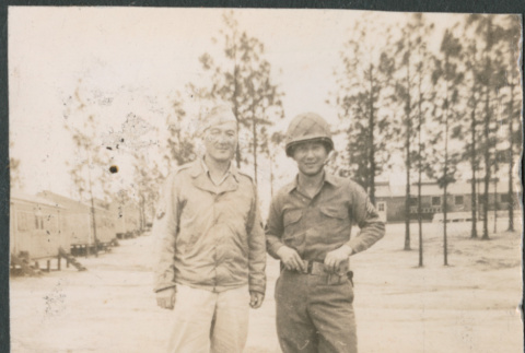 Two men in military fatigues (ddr-densho-523-142)