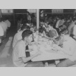 [Teenagers eating at the mess hall] (ddr-csujad-29-216)