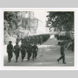 Members of the 100th Infantry Battalion marching in Vada, Italy (ddr-densho-1007-143)