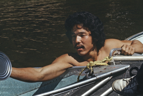 Calvin Iyoya in the lake during boat sink (ddr-densho-336-1116)