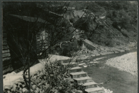 Three people walking up stairs (ddr-densho-523-471)