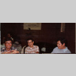 Three men sitting around table (ddr-densho-426-1269)