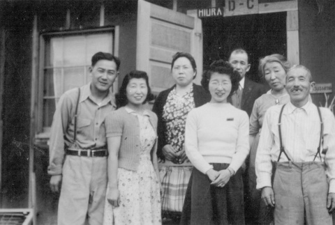 Family outside a barrack (ddr-densho-102-25)