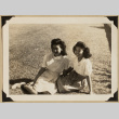 Jackie and Miyo on a lawn (ddr-densho-542-560)