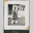 African American man wearing apron outside building (ddr-densho-434-169)