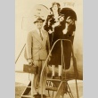 Douglas Fairbanks and Sylvia Ashley leaving for England (ddr-njpa-1-393)