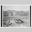 Aerial view of buildings and hills (ddr-densho-1007-187)